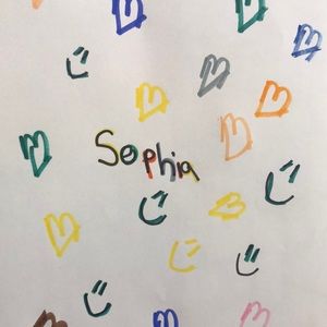 It made  by hand and it has smile faces and heart I use yellow and grey